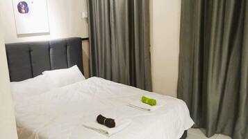 Apartemen Comfort, balkon | 2 kamar tidur, setrika/meja setrika, dan Wi-Fi gratis