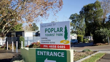 Enjoy easy access to cabins, campsites, and powered sites at Poplar Tourist Park.