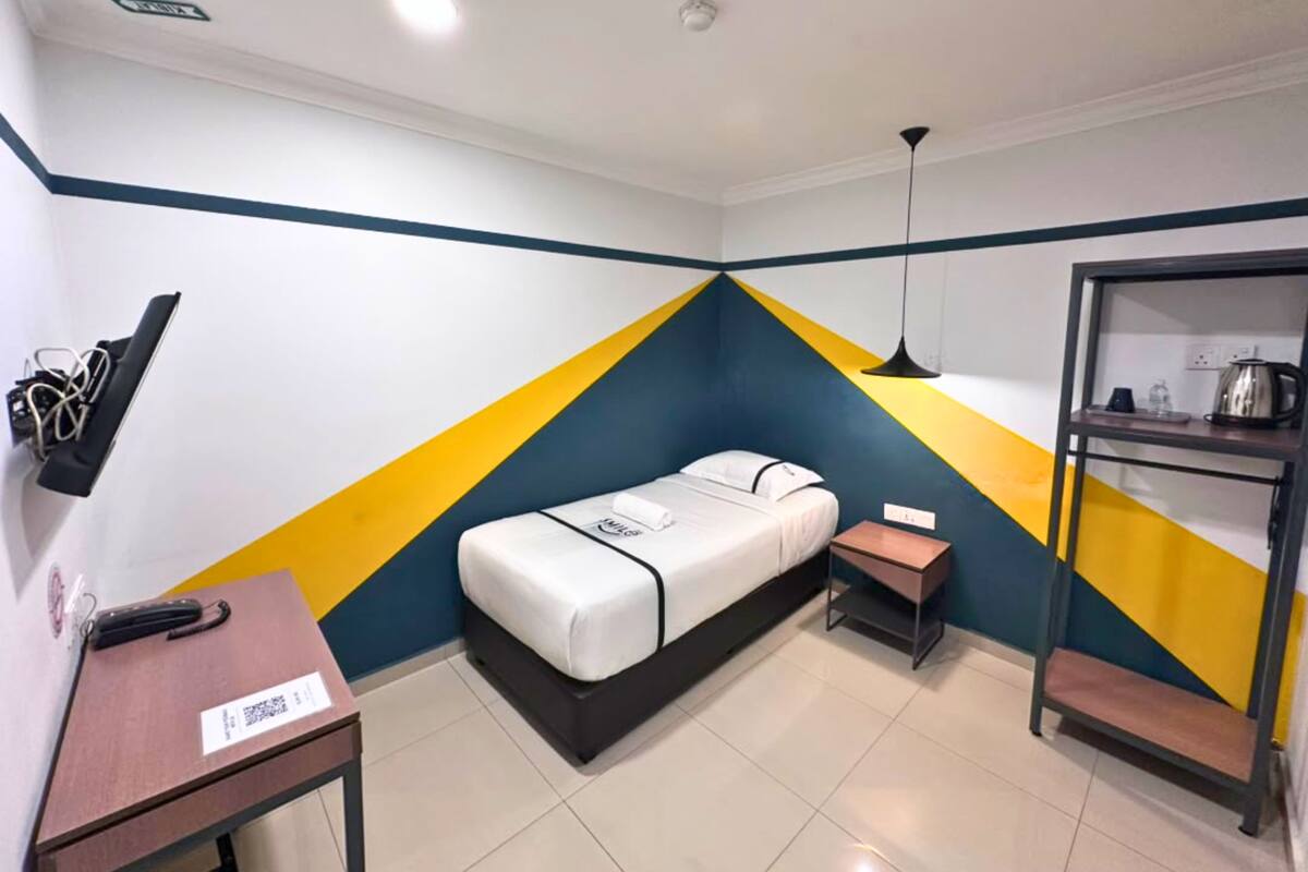 Habitación individual | Escritorio, tabla de planchar con plancha, wifi gratis