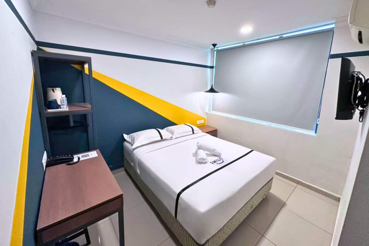 Habitación Deluxe | Escritorio, tabla de planchar con plancha, wifi gratis