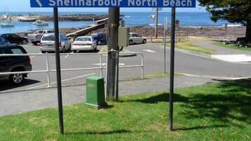 A directional sign for Shellharbour South Beach and Shellharbour North Beach.