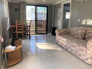 Economy Caravan with Annex - No Ensuite | Living area | Flat-screen TV - Shellharbour Holiday Village (Barrack Point)