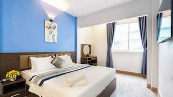 Habitación Deluxe doble | Minibar, escritorio, wifi gratis y ropa de cama