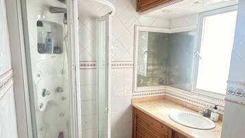 Shower, hair dryer, bidet, towels