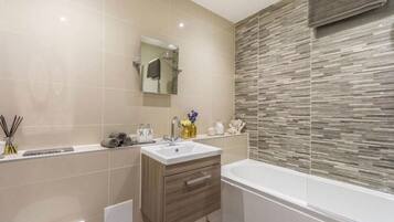 Hair dryer, towels, soap, shampoo