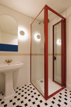 Standard Suite, City View | Bathroom | Shower, free toiletries, towels, soap