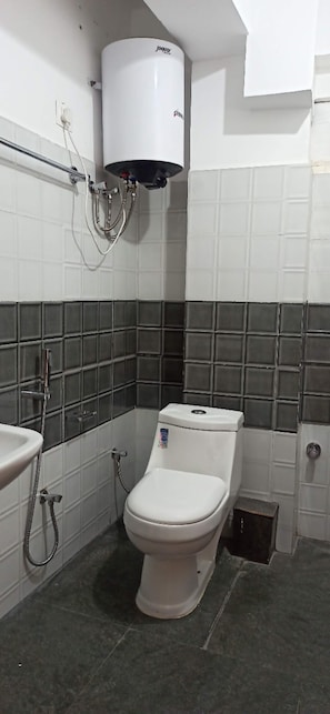 Shower, rainfall showerhead, towels, soap