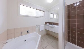 Shower, jetted bath, eco-friendly toiletries, hair dryer