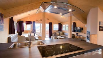 Chalet | Private kitchen | Electric kettle, toaster, high chair