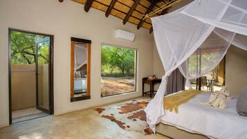 Honeymoon Suite, Patio, Pool View | Down comforters, in-room safe, bed sheets