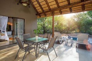 Honeymoon Suite, Patio, Pool View | Terrace/patio - Kubu Bush Lodge (Hoedspruit)