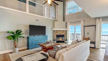 Smart TV, fireplace, foosball, books