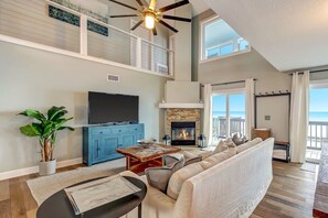 Smart TV, fireplace, foosball, books