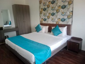 Deluxe Double Room, Garden View | Premium bedding, down comforters, pillowtop beds, soundproofing - Arristo Resorts & Club (Ahmedabad)