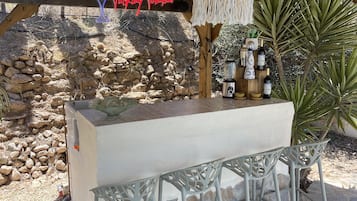 Apartamento | Restaurante al aire libre
