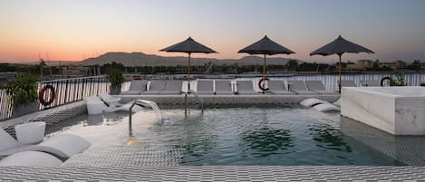 Outdoor pool, sun loungers