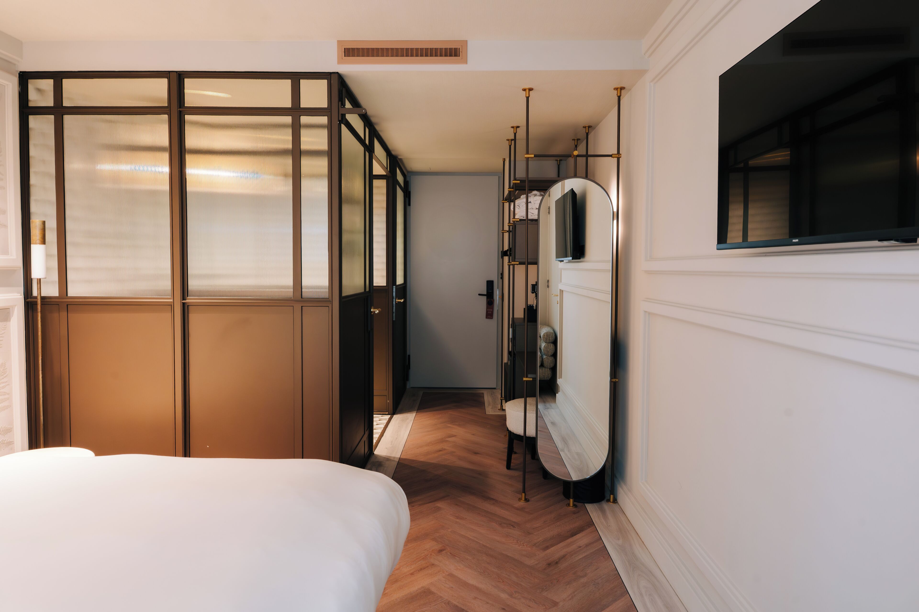 Luxe beddengoed, een gratis minibar, een kluis op de kamer, een bureau