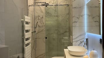 Hair dryer, towels, soap, shampoo