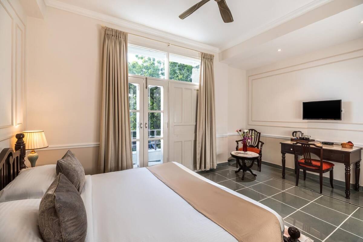 Deluxe Room | Desk, laptop workspace, WiFi (free), bed sheets