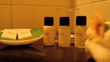 Shower, bathrobes, slippers, towels