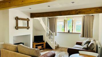 Cottage | Living area | TV, fireplace