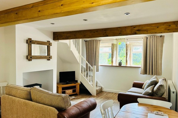 Cottage | Living area | TV, fireplace