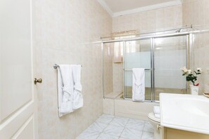 Shower, towels, soap, shampoo