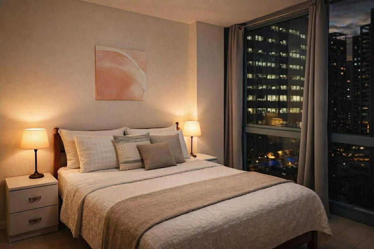 Deluxe Condo | Living area | 36-inch Smart TV with digital channels