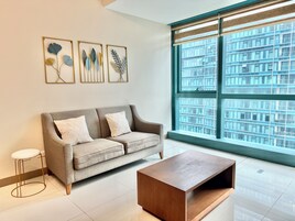 City Condo, 1 Double Bed with Sofa bed, Non Smoking, City View | Living area | 36-inch Smart TV with digital channels