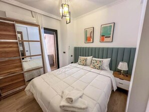1 quarto, berço de viagem, Wi-Fi de cortesia, roupa de cama