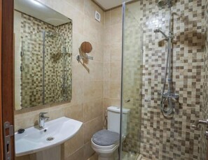 Hair dryer, towels, soap, shampoo