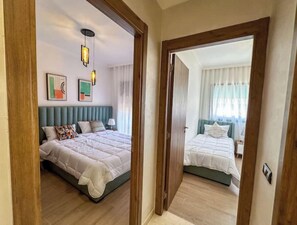 2 bedrooms, travel cot, free WiFi, bed sheets