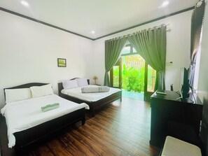 Kamar Double Standar, pemandangan kebun | Meja kerja, tirai kedap cahaya, dan Wi-Fi gratis
