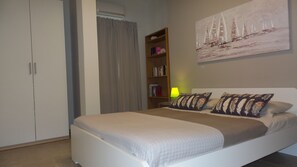 2 bedrooms, desk, iron/ironing board, travel crib