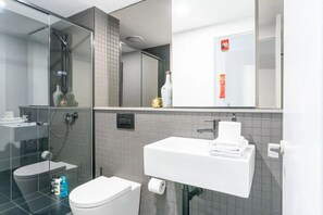 Hair dryer, soap, shampoo, toilet paper