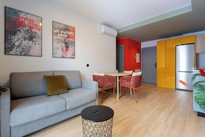 Basic Apartment, 1 Bedroom | Living area | 42-inch flat-screen TV with cable channels