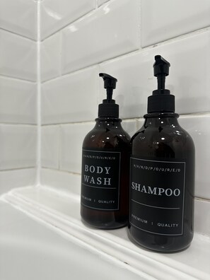 Hair dryer, towels, soap, shampoo