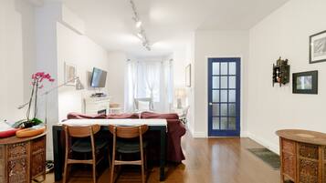 Smart TV, fireplace, books