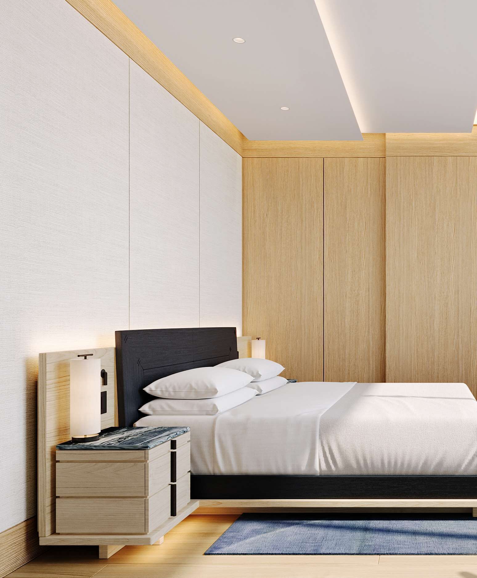 A modern bedroom with a bed, bedside tables, and a nightstand.