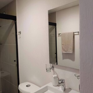 Hair dryer, towels, soap, shampoo