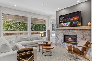 Smart TV, fireplace, foosball, books