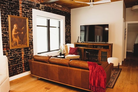 Fireplace. The Ashton is a 1 bed/1 bath open concept apartment.