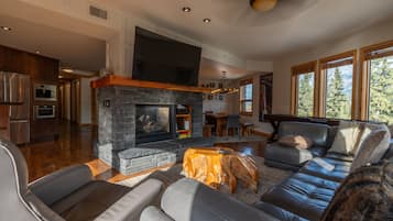 Condo | Living area | 40-inch Smart TV with satellite channels, fireplace
