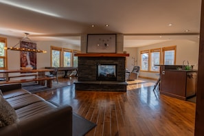Condo | Living area | 40-inch Smart TV with satellite channels, fireplace