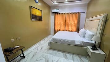 Deluxe Room, Balcony, City View | Desk, laptop workspace, free WiFi