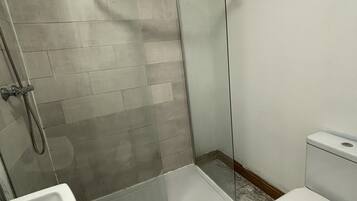 Shower, towels, soap, shampoo