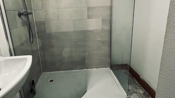 Shower, towels, soap, shampoo