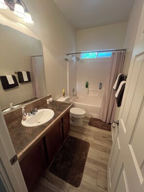 Hair dryer, towels, soap, shampoo