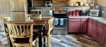 One of a kind, property with 3 charming houses, horse facility and pets welcome.