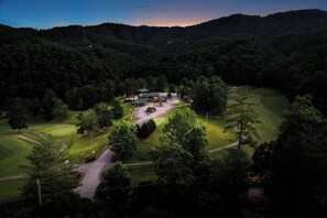 Enjoy a round of golf surrounded by lush greenery and scenic views from the clubhouse.